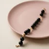 PHORUS PULSERA NEGRA DE INVITADA